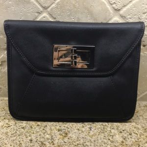 Black clutch purse silver turn lock. New.